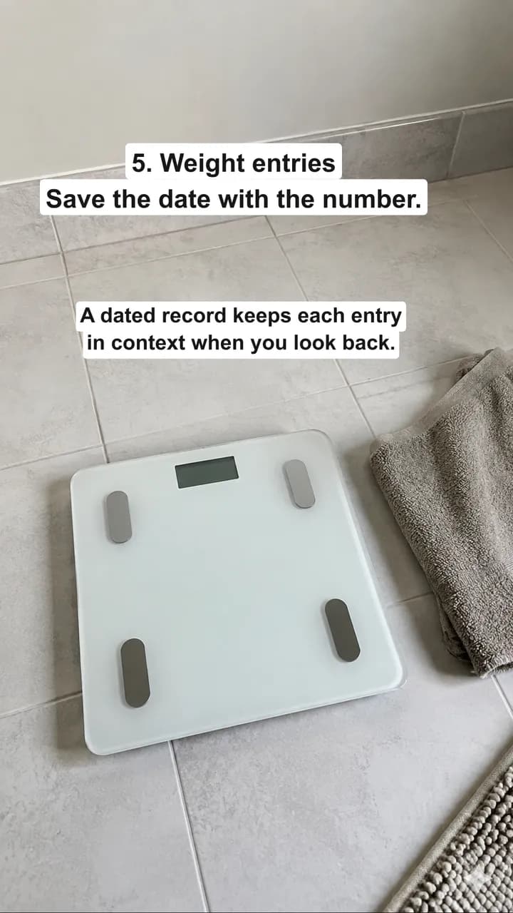 Weight entries slide over a scale on a tiled floor.